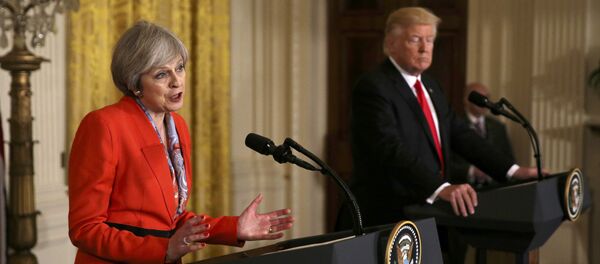 British Prime Minister Theresa May speaks as US President Donald Trump listens during their joint news conference at the White House in Washington, US, January 27, 2017 British Prime Minister Theresa May speaks as US President Donald Trump listens during their joint news conference at the White House in Washington, US, January 27, 2017 - Sputnik International