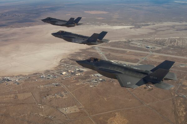Three F-35 Joint Strike Fighters, (rear to front) AF-2, AF-3 and AF-4, flies over Edwards Air Force Base in this December 10, 2011 handout photo provided by Lockheed Martin Three F-35 Joint Strike Fighters, (rear to front) AF-2, AF-3 and AF-4, flies over Edwards Air Force Base in this December 10, 2011 handout photo provided by Lockheed Martin - Sputnik International