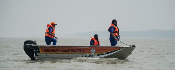 Malaysian search and rescue teams carry out a search operation (File) - Sputnik International