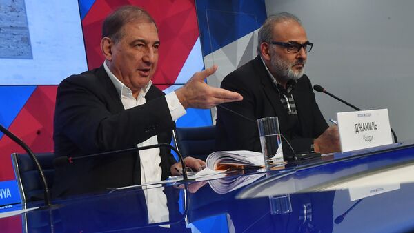 Qadri Jamil, left, chairman of the Syrian opposition's Moscow group, secretary of the People's Will Party and one of the leaders of the Popular Front for Change and Liberation, with Jamal Suleiman, a representative of the Syrian opposition's Cairo group, during a news conference at the Rossiya Segodnya International Multimedia Press Center in Moscow - Sputnik International