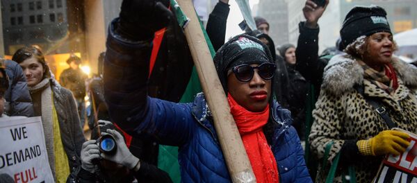 People participate in a Black Lives Matter protest in front of Trump Tower in New York City, U.S. January 14, 2017. - Sputnik International