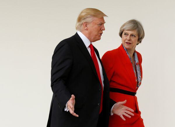 US President Donald Trump escorts British Prime Minister Theresa May after their meeting at the White House in Washington, US, January 27, 2017.  - Sputnik International
