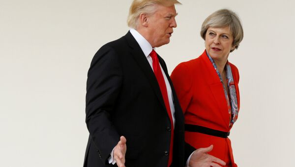 US President Donald Trump escorts British Prime Minister Theresa May after their meeting at the White House in Washington, US, January 27, 2017. - Sputnik International