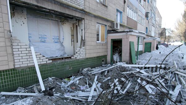 A destroyed balcony of a residential building on Partizanskaya Street in Donetsk, damaged during a shelling by the Ukrainian military - Sputnik International