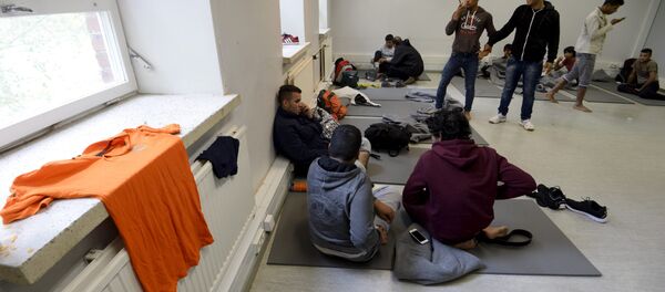 Iraqi migrants are pictured inside a refugee center located in former barracks, in Lahti, Finland Iraqi migrants are pictured inside a refugee center located in former barracks, in Lahti, Finland - Sputnik International