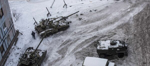 Ukrainian tanks stand in the yard of an apartment block in Avdiivka, eastern Ukraine Ukrainian tanks stand in the yard of an apartment block in Avdiivka, eastern Ukraine - Sputnik International