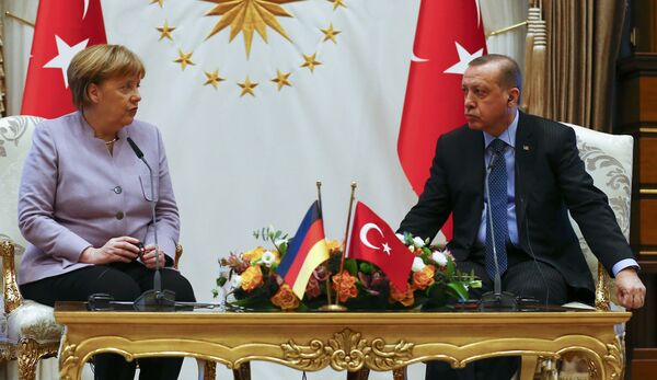 Turkish President Recep Tayyip Erdogan and German Chancellor Angela Merkel meet at the presidential palace during the first visit since July's failed coup in Ankara, Turkey, February 2, 2017. Turkish President Recep Tayyip Erdogan and German Chancellor Angela Merkel meet at the presidential palace during the first visit since July's failed coup in Ankara, Turkey, February 2, 2017. - Sputnik International