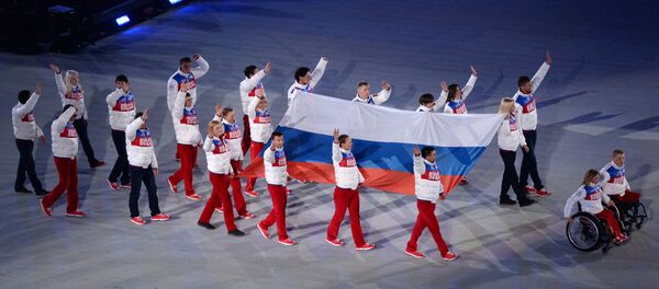 The Russian national flag carried out at the closing ceremony of the Sochi 2014 Winter Paralympics. (File) The Russian national flag carried out at the closing ceremony of the Sochi 2014 Winter Paralympics. (File) - Sputnik International