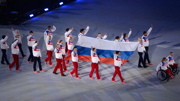 The Russian national flag carried out at the closing ceremony of the Sochi 2014 Winter Paralympics. (File) - Sputnik International