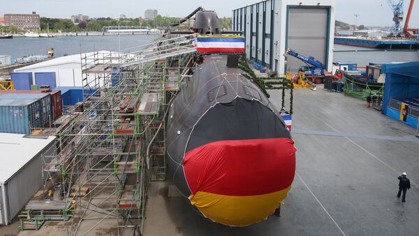 Shipyard workers and German soldiers attend the christening of the U36, a new 212A class submarine for the German Marine at the ThyssenKrupp Marine Systems shipyard in Kiel, northern Germany. (File) - Sputnik International