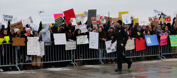 Hundreds of people rally against a temporary travel ban signed by U.S. President Donald Trump in an executive order during a protest at Detroit Metropolitan airport in Romulus, Michigan, U.S., January 29, 2017. Hundreds of people rally against a temporary travel ban signed by U.S. President Donald Trump in an executive order during a protest at Detroit Metropolitan airport in Romulus, Michigan, U.S., January 29, 2017. - Sputnik International