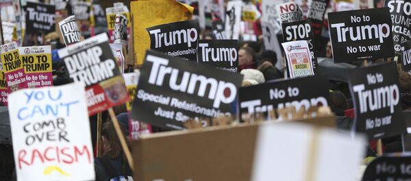 Demonstrators march against U.S. President Donald Trump and his temporary ban on refugees and nationals from seven Muslim-majority countries from entering the United States, during a protest in London, Britain, February 4, 2017 Demonstrators march against U.S. President Donald Trump and his temporary ban on refugees and nationals from seven Muslim-majority countries from entering the United States, during a protest in London, Britain, February 4, 2017 - Sputnik International