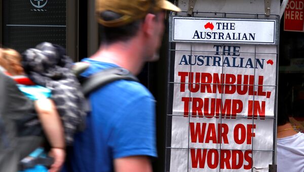 A pedestrian looks at a newspaper headline regarding U.S. President Donald Trump and Australian Prime Minister Malcolm Turnbull in central Sydney, Australia, February 3, 2017 - Sputnik International