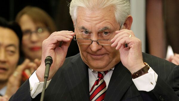 U.S. Secretary of State Rex Tillerson removes his glasses after delivering remarks to Department of State employees upon arrival at the Department of State in Washington, U.S., February 2, 2017 - Sputnik International
