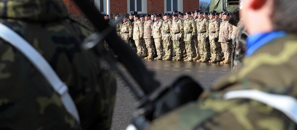 Members of Eurocorps military contingent take part in a ceremony in honor of the families of the 150 soldiers who will go to Afghanistan on January 10 for a six-month-period joining Afghanistan International Security Assistance Force (FIAS), on January 4, 2012 at Eurocorps headquarters in Strasbourg, eastern France Members of Eurocorps military contingent take part in a ceremony in honor of the families of the 150 soldiers who will go to Afghanistan on January 10 for a six-month-period joining Afghanistan International Security Assistance Force (FIAS), on January 4, 2012 at Eurocorps headquarters in Strasbourg, eastern France - Sputnik International