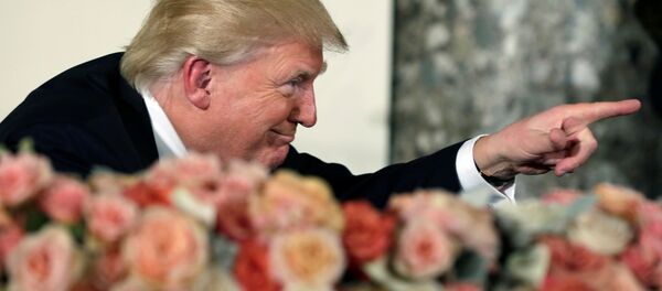 US President Donald Trump gestures during the Inaugural luncheon at the National Statuary Hall after being sworn-in on Capitol Hill in Washington, US, January 20, 2017. US President Donald Trump gestures during the Inaugural luncheon at the National Statuary Hall after being sworn-in on Capitol Hill in Washington, US, January 20, 2017. - Sputnik International