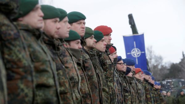 German soldiers attend a ceremony to welcome the German battalion being deployed to Lithuania as part of NATO deterrence measures against Russia in Rukla, Lithuania February 7, 2017 - Sputnik International