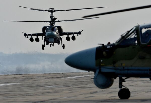 Ka-52 Alligator helicopters during tactical flight training. (File) Ka-52 Alligator helicopters during tactical flight training. (File) - Sputnik International