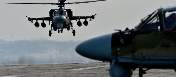 Ka-52 Alligator helicopters during tactical flight training. (File) - Sputnik International