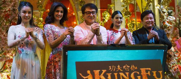 The cast of Kung Fu Yoga, from left, Miya Muqi, Disha Patani, Jackie Chan, Amyra Dastur and Stanley Tong pose for a group photo during an event to promote their new movie Kung Fu Yoga at a shopping mall in Kuala Lumpur, Malaysia, Saturday, Jan. 21, 2017. - Sputnik International
