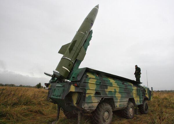 Tochka short-range tactical ballistic missile being prepared for launch at a test area in the Kaliningrad Region Tochka short-range tactical ballistic missile being prepared for launch at a test area in the Kaliningrad Region - Sputnik International