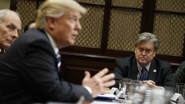 White House Chief Strategist Steve Bannon listens at right as President Donald Trump speaks during a meeting on cyber security in the Roosevelt Room of the White House in Washington, Tuesday, Jan. 31, 2017. - Sputnik International