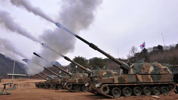 South Korean army K9 Thunder 155mm self-propelled Howitzers fire during a live-fire drill in Pocheon, 65 kms northeast of Seoul - Sputnik International
