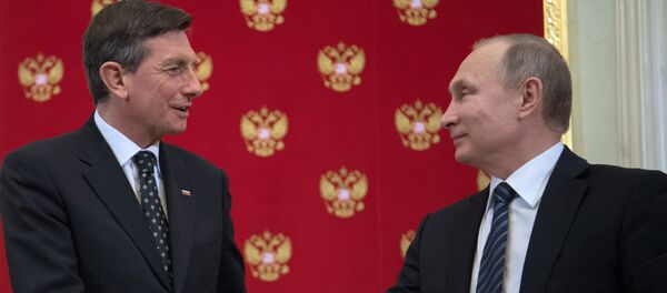 Russian President Vladimir Putin and Slovenia's President Borut Pahor, left, during a joint press conference following their meeting Russian President Vladimir Putin and Slovenia's President Borut Pahor, left, during a joint press conference following their meeting - Sputnik International