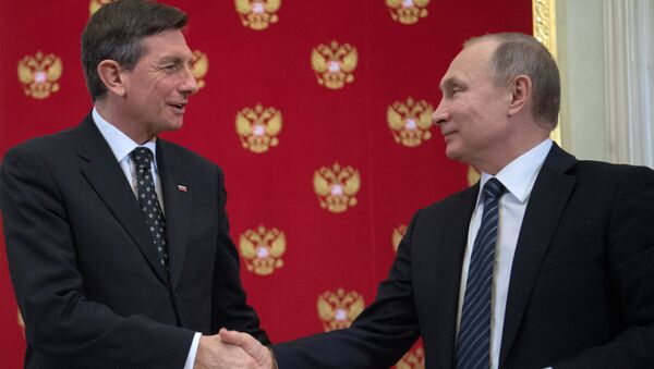 Russian President Vladimir Putin and Slovenia's President Borut Pahor, left, during a joint press conference following their meeting - Sputnik International