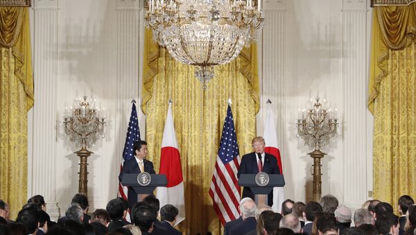 President Donald Trump and Japanese Prime Minister Shinzo Abe participate in a joint news conference in the East Room of the White House in Washington - Sputnik International