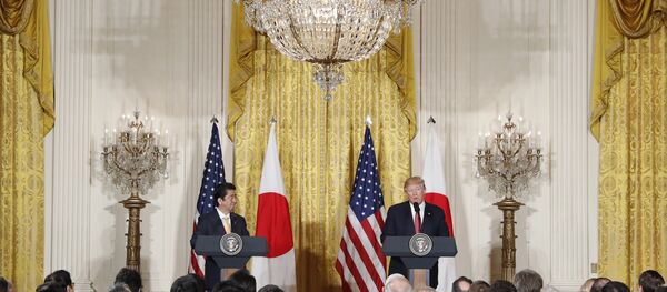 President Donald Trump and Japanese Prime Minister Shinzo Abe participate in a joint news conference in the East Room of the White House in Washington President Donald Trump and Japanese Prime Minister Shinzo Abe participate in a joint news conference in the East Room of the White House in Washington - Sputnik International