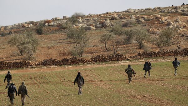 Free Syrian Army fighters are seen in al Baza'a village in the outskirts of al-Bab town, Syria - Sputnik International