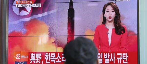 A man watches a TV news program reporting about North Korea's missile launch at the Seoul Train Station in Seoul, South Korea, Sunday, Feb. 12, 2017 A man watches a TV news program reporting about North Korea's missile launch at the Seoul Train Station in Seoul, South Korea, Sunday, Feb. 12, 2017 - Sputnik International