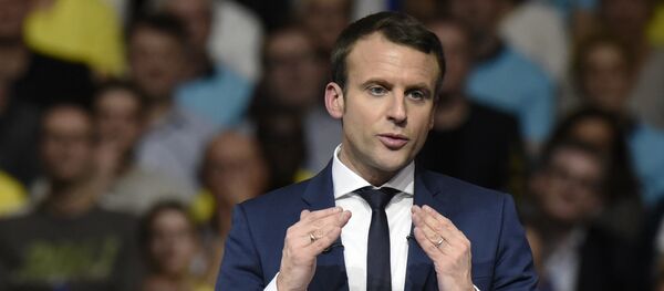 Former French Economy Minister, founder and president of the political movement En Marche ! and candidate for the France's 2017 presidential elections Emmanuel Macron speaks during a public meeting at the Palais des Sports in Lyon, on February 4, 2017 - Sputnik International