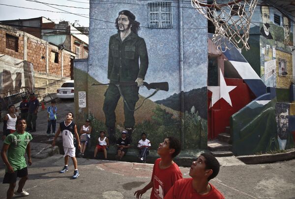 Valery Melnikov's award-winning photo of children from the La Piedrita community playing street basketball in Caracas, Venezuela Valery Melnikov's award-winning photo of children from the La Piedrita community playing street basketball in Caracas, Venezuela - Sputnik International