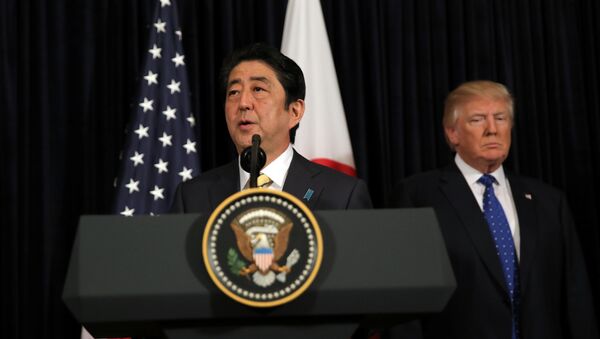 Japanese Prime Minister Shinzo Abe delivers remarks on North Korea accompanied by U.S. President Donald Trump at Mar-a-Lago club in Palm Beach, Florida U.S., February 11, 2017 - Sputnik International