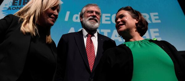 Sinn Fein's Michelle O'Neill (L), Gerry Adams and Mary Lou McDonald pose for a picture at a Sinn Fein conference on Irish Unity in Dublin, Ireland January 21, 2017 Sinn Fein's Michelle O'Neill (L), Gerry Adams and Mary Lou McDonald pose for a picture at a Sinn Fein conference on Irish Unity in Dublin, Ireland January 21, 2017 - Sputnik International