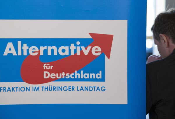 Bjoern Hoecke, chairman of the Alternative fuer Deutschland (AfD) in the German state of Thuringia, leaves after a press statement in Erfurt, central Germany, Monday, Feb. 13, 2017 Bjoern Hoecke, chairman of the Alternative fuer Deutschland (AfD) in the German state of Thuringia, leaves after a press statement in Erfurt, central Germany, Monday, Feb. 13, 2017 - Sputnik International