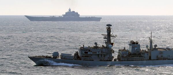 British Navy and Air Force escort Admiral Kuznetsov aircraft carrier through the English Channel British Navy and Air Force escort Admiral Kuznetsov aircraft carrier through the English Channel - Sputnik International