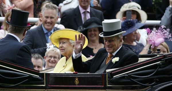 Britain's Queen Elizabeth II, looks up as Prince Philip, right, waves during their arrival by carriage on the first day of the Royal Ascot horse race meeting at Ascot, England, Tuesday, June, 14, 2016 Britain's Queen Elizabeth II, looks up as Prince Philip, right, waves during their arrival by carriage on the first day of the Royal Ascot horse race meeting at Ascot, England, Tuesday, June, 14, 2016 - Sputnik International