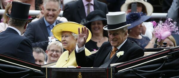 Britain's Queen Elizabeth II, looks up as Prince Philip, right, waves during their arrival by carriage on the first day of the Royal Ascot horse race meeting at Ascot, England, Tuesday, June, 14, 2016 Britain's Queen Elizabeth II, looks up as Prince Philip, right, waves during their arrival by carriage on the first day of the Royal Ascot horse race meeting at Ascot, England, Tuesday, June, 14, 2016 - Sputnik International