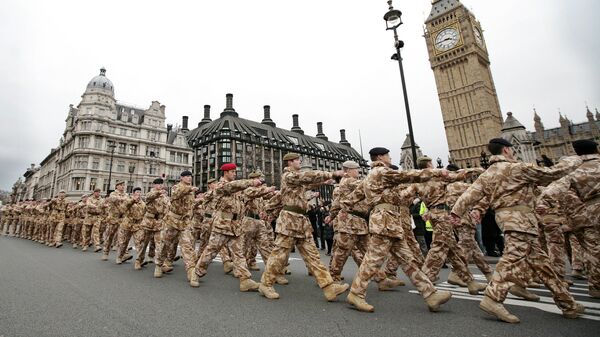 Soldiers from the British 7th Armoured Brigade who have returned from service on operations in Iraq march past Big Ben in London (File) - Sputnik International