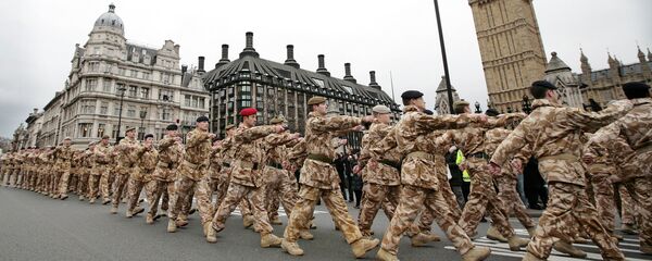 Soldiers from the British 7th Armoured Brigade who have returned from service on operations in Iraq march past Big Ben in London (File) Soldiers from the British 7th Armoured Brigade who have returned from service on operations in Iraq march past Big Ben in London (File) - Sputnik International