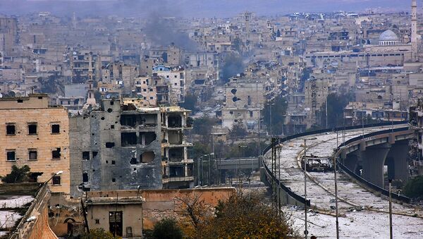 A picture taken on December 5, 2016 shows destroyed buildings in Aleppo's eastern al-Shaar neighbourhood as Syrian pro-government troops advance towards the area through Karm al-Jabal district during their offensive to retake Syria's second city - Sputnik International