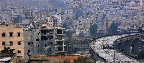A general view shows the damage in the government-held al-Shaar neighborhood of Aleppo, during a media tour, Syria December 13, 2016. A general view shows the damage in the government-held al-Shaar neighborhood of Aleppo, during a media tour, Syria December 13, 2016. - Sputnik International