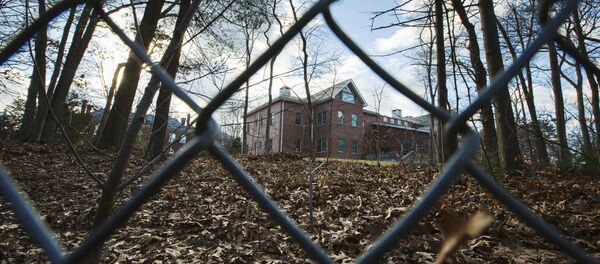 A fence encloses an estate in the village of Upper Brookville in the town of Oyster Bay, N.Y., on Long Island on Friday, Dec. 30, 2016 - Sputnik International
