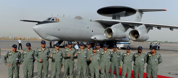 Indian Air Force (IAF) officers and crew of the Airborne Warning and Control System (AWACS) aeroplane pose for the media during the induction ceremony of the first AWACS equipped IL-76 aircraft at Air Foce station in New Delhi (File) - Sputnik International