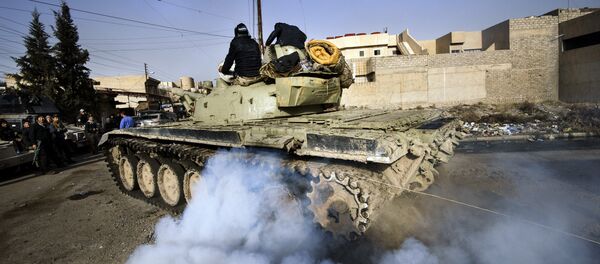 Iraqi army T-72 tank heads to the frontline (File) Iraqi army T-72 tank heads to the frontline (File) - Sputnik International