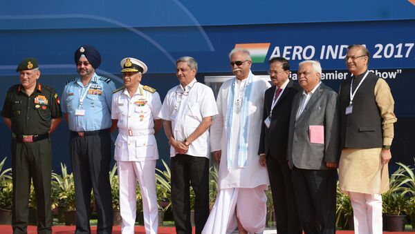Indian Defense Minister Manohar Parrikar (4L), National Security Advisor Ajit Doval (3R), Air Chief Marshal of the Indian Air Force Birender Singh Dhanoa (2L) and other dignitaries pose on the inaugural day of the 11th edition of 'Aero India', a biennial air show and aviation exhibition, in Bangalore on February 14, 2017 - Sputnik International