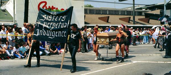 The Sisters of Perpetual Indulgence. Gothic drag. And they appear to be in the parade for a reason - to fulfill a dying wish - this is a real funeral procession - in 1991 - AIDS had people dropping left and right The Sisters of Perpetual Indulgence. Gothic drag. And they appear to be in the parade for a reason - to fulfill a dying wish - this is a real funeral procession - in 1991 - AIDS had people dropping left and right - Sputnik International